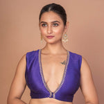 Woman Wearing a Royal Blue V-Neckline Sleeveless Blouse with Embroidered Work: Festive Wear Blouse - Anvi Couture - Image 1