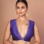 Woman Wearing a Royal Blue V-Neckline Sleeveless Blouse with Embroidered Work: Anvi Couture - Image 2