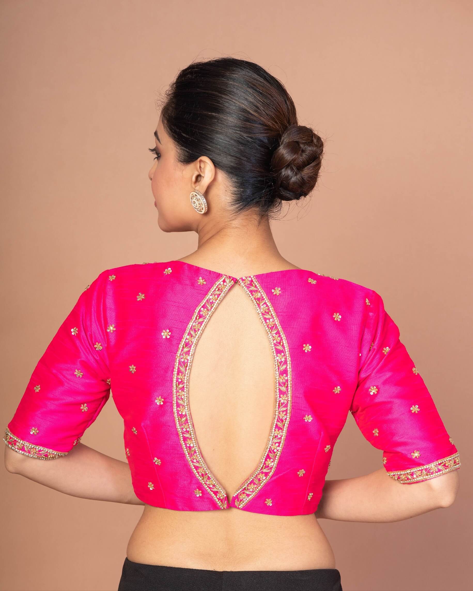 Woman Wearing a Hot Pink Hand Embroidered Blouse in Raw Silk with Boat Neckline and Back cutout: Bridal Blouse - Anvi Couture - Image 4