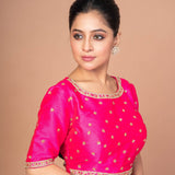 Woman Dressed in Hot Pink Hand Embroidered Blouse in Raw Silk with Boat Neckline and Back cutout: Anvi Couture - Image 3