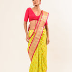 Buy our Floral Lime Green Kanjivaram Pure Silk Saree, perfect blend of traditional and contemporary styles - Anvi Couture.