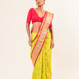 Buy our Floral Lime Green Kanjivaram Pure Silk Saree, perfect blend of traditional and contemporary styles - Anvi Couture.