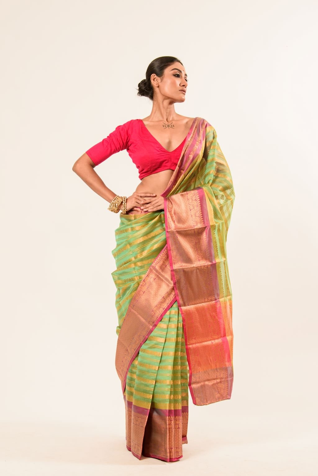 Green Organza Silk Saree with Pink Border and Gold Strip - Image 1