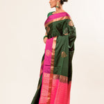 Castleton Green Kanjeevaram Silk Saree with Pink and Gold Border - Anvi Couture