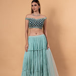 Pastel Blue Lehenga Set With Heavy Embroidered Off Shoulder Choli and Net Dupatta - Anvi Couture