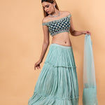 Pastel Blue Lehenga Set With Heavy Embroidered Off Shoulder Choli and Net Dupatta - Anvi Couture