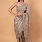Silver Tissue Silk Saree with All - Over Zari Embellished Floral Work - Anvi Couture