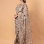 Silver Tissue Silk Saree with All - Over Zari Embellished Floral Work - Anvi Couture