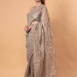 Silver Tissue Silk Saree with All - Over Zari Embellished Floral Work - Anvi Couture