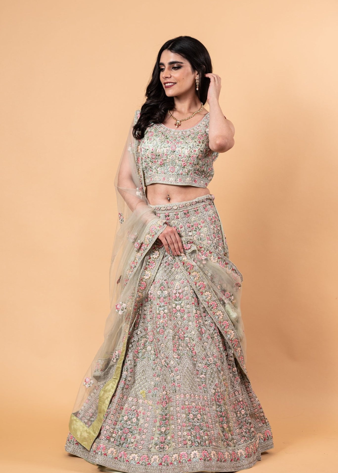Net Pastel Lehenga and Choli Set with All Over Handwork Embroidery and Tassel Dupatta 