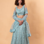 Angel Blue Lehenga and Choli Embellished with intricate Embroidery and Stonework - Anvi Couture