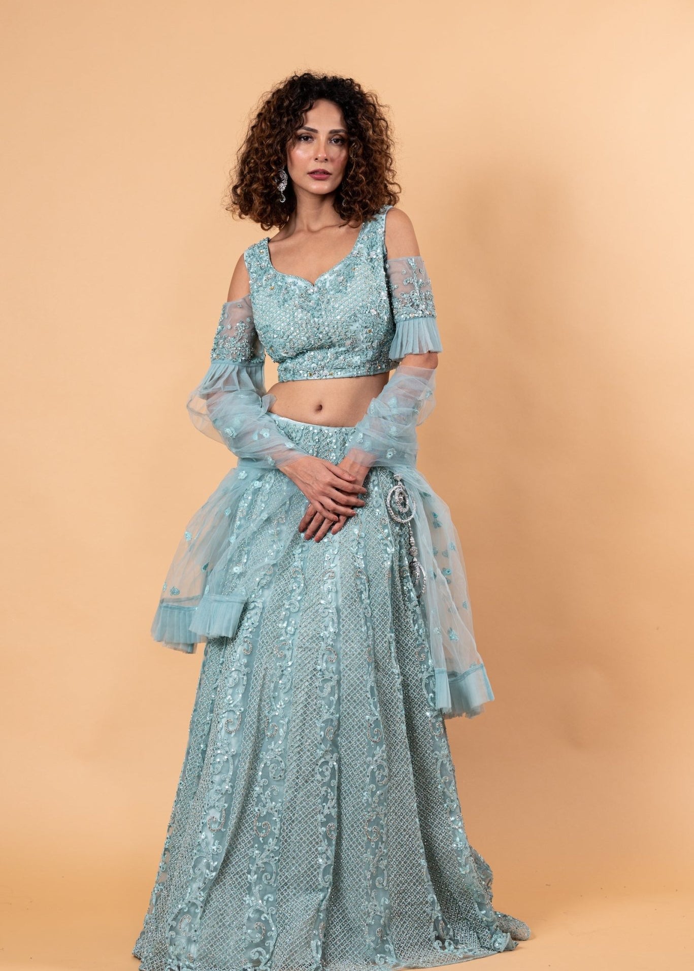 Angel Blue Lehenga and Choli Embellished with intricate Embroidery and Stonework - Anvi Couture