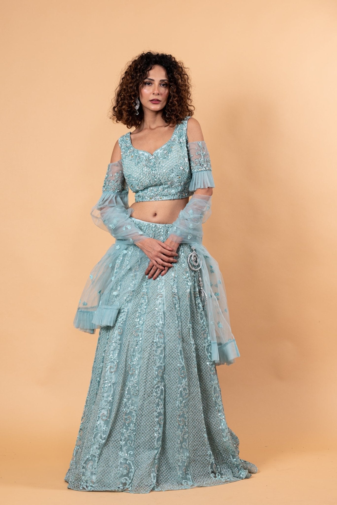 Angel Blue Lehenga and Choli Embellished with intricate Embroidery and Stonework - Anvi Couture