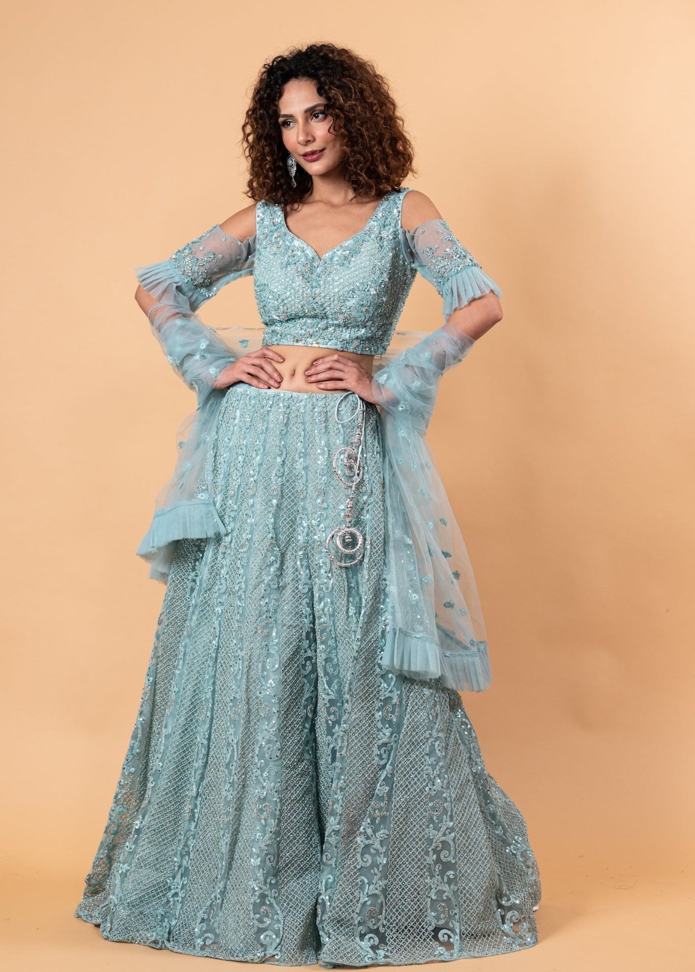 Angel Blue Lehenga and Choli Embellished with intricate Embroidery and Stonework - Anvi Couture