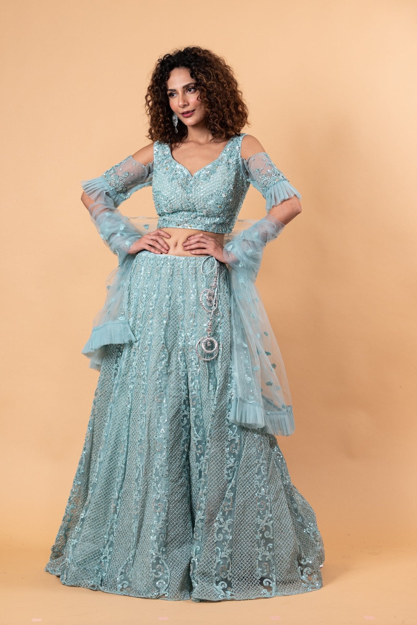 Angel Blue Lehenga and Choli Embellished with intricate Embroidery and Stonework - Anvi Couture