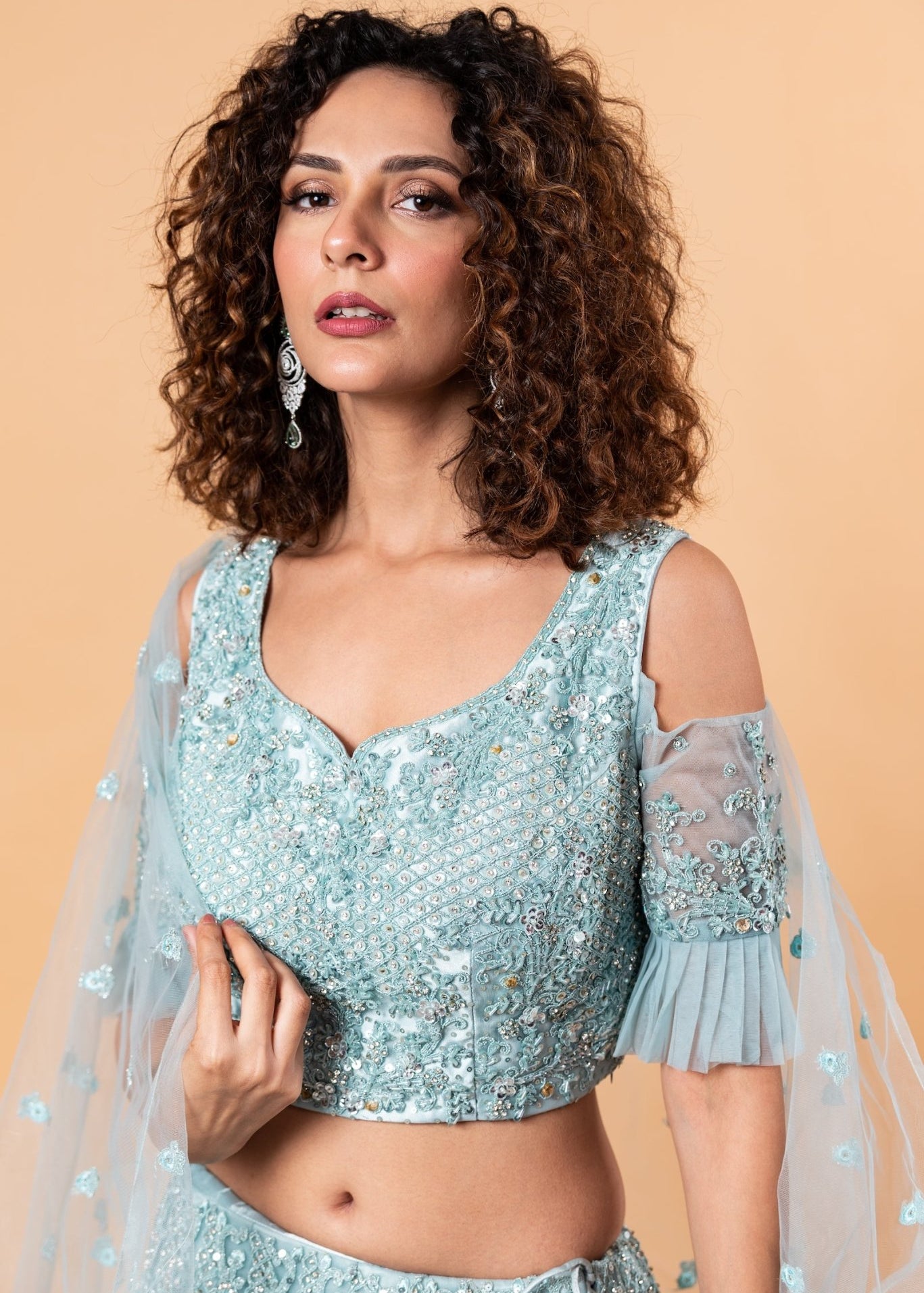 Angel Blue Lehenga and Choli Embellished with intricate Embroidery and Stonework - Anvi Couture