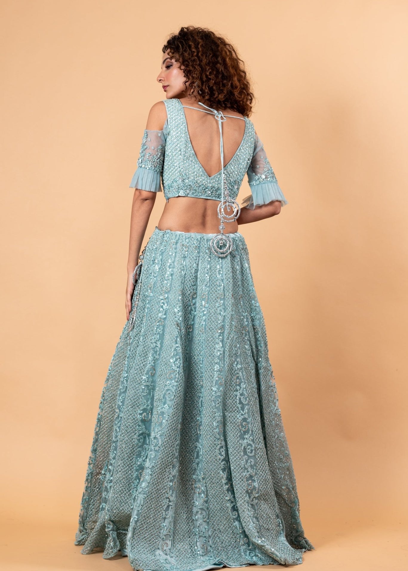 Angel Blue Lehenga and Choli Embellished with intricate Embroidery and Stonework - Anvi Couture