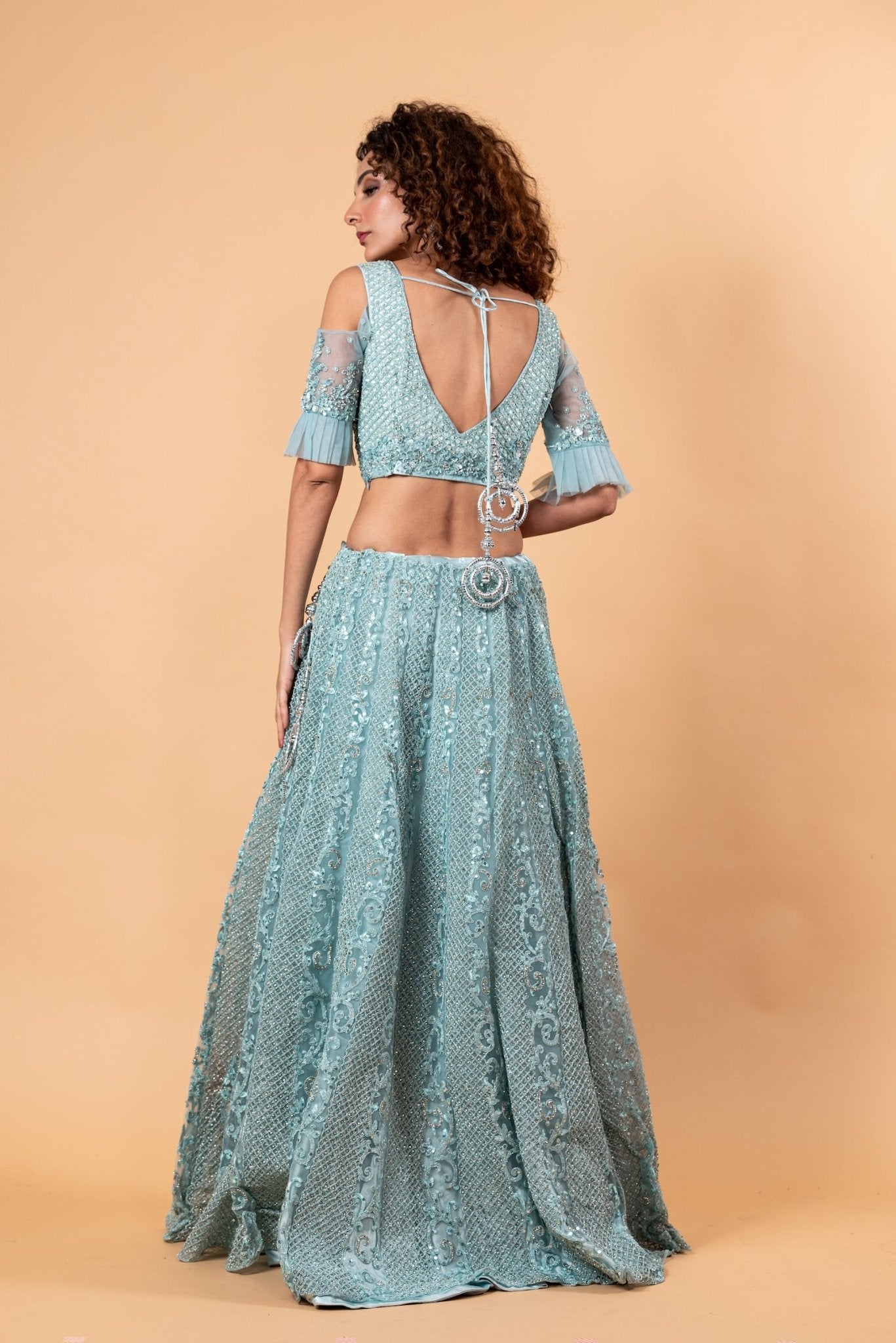Angel Blue Lehenga and Choli Embellished with intricate Embroidery and Stonework - Anvi Couture