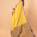 Yellow Gadwal Silk Saree with Contrasting Blue and Gold Zari Work - Anvi Couture