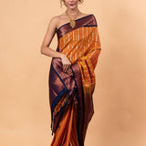 Orange Kanjivaram Silk Saree with Copper and Blue Border and Pallu - Image 1