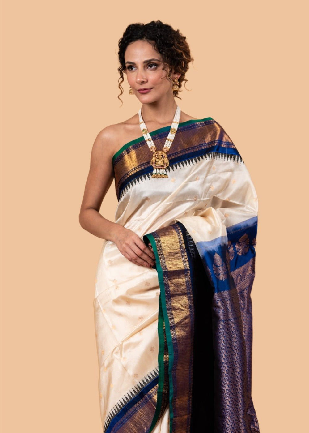 Pearl White Gadwal Silk Saree with Floral Motifs - Anvi Couture