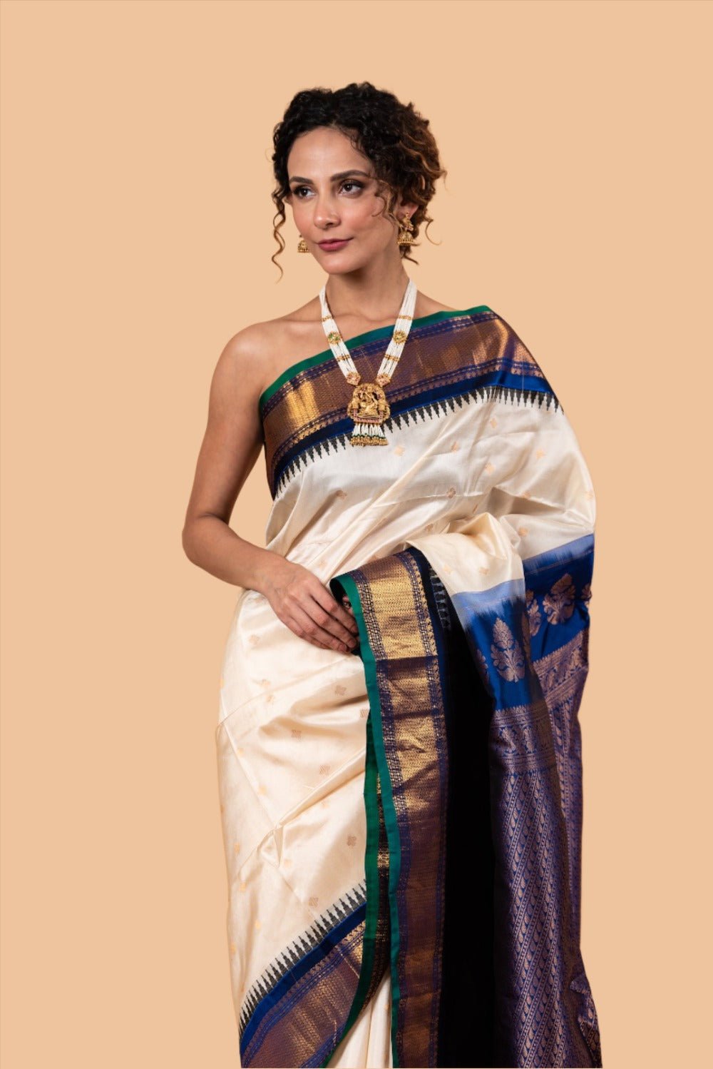 Pearl White Gadwal Silk Saree with Floral Motifs - Anvi Couture