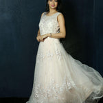 Light Pink Net gown adorned with Swarovski work