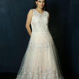 Light Pink Net gown adorned with Swarovski work