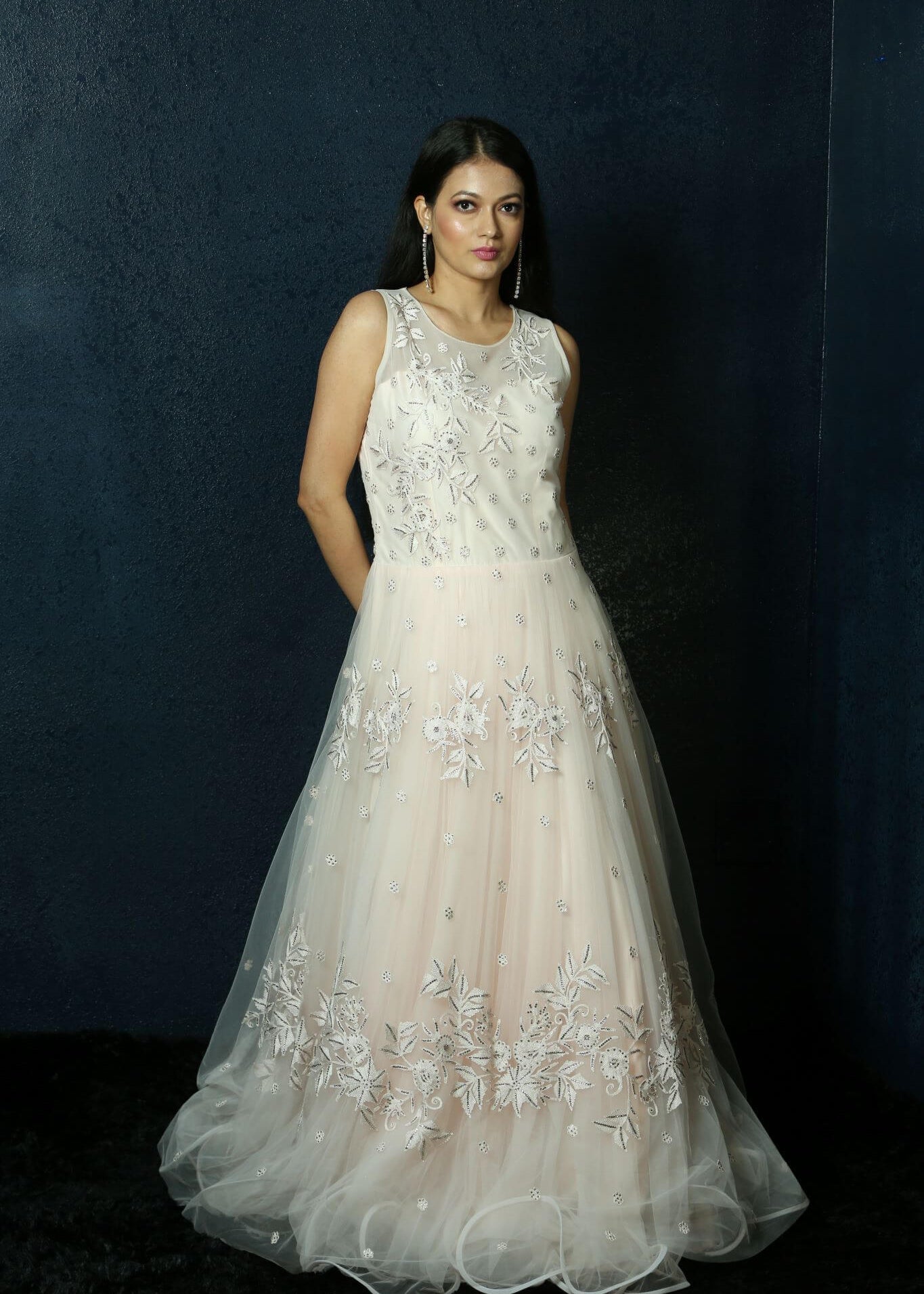 Light Pink Net gown adorned with Swarovski work