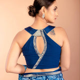 Back view of blue floral georgette saree showing draped pallu and blouse - Anvi Couture