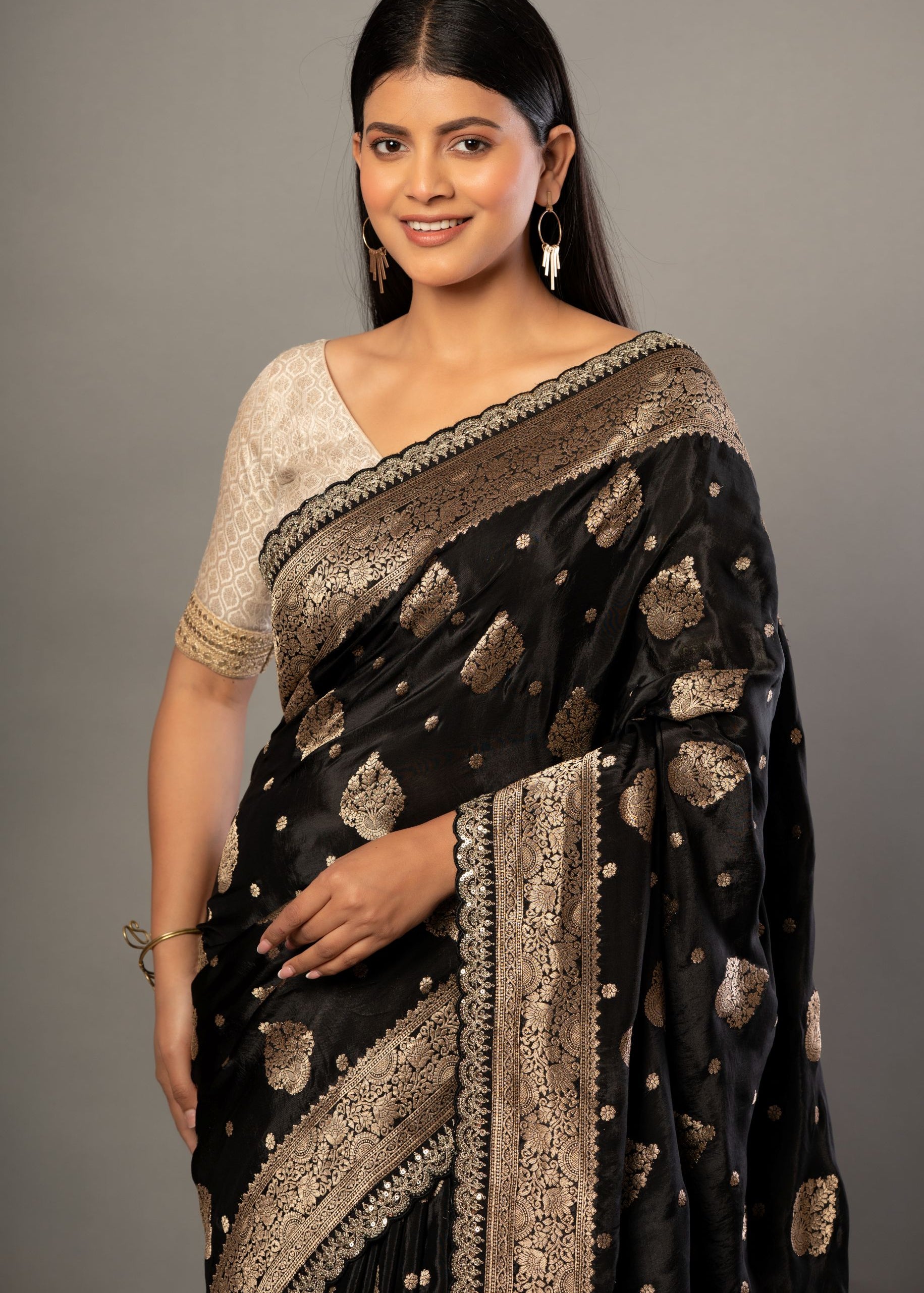 Black Banarsi Saree with Golden Floral Weaved and Embroidered Border Close Up
