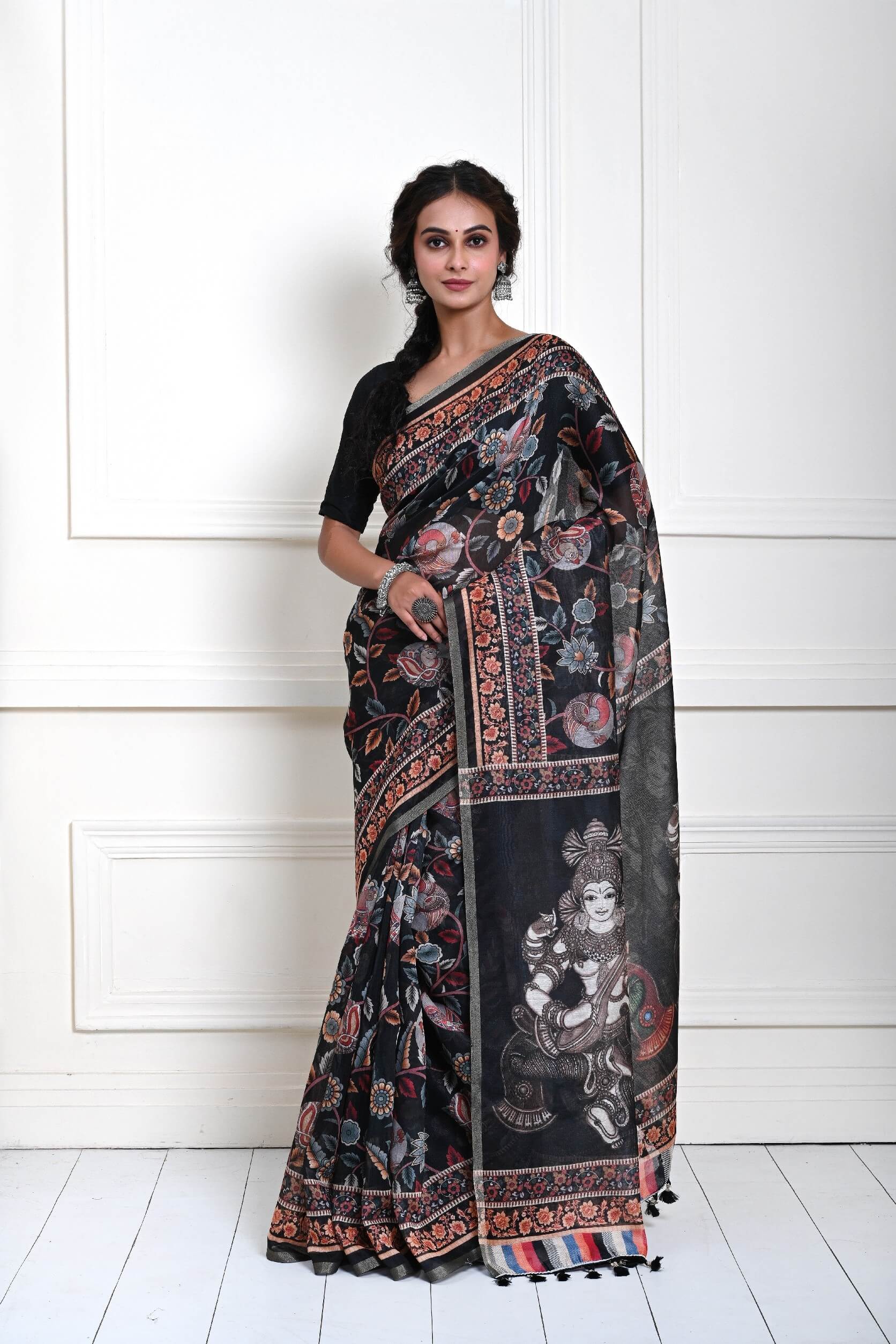 Black Kalamkari printed saree with traditional motifs in cotton silk