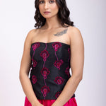 Black Off Shoulder Corset And Drape Skirt With Pink Embroidery And Cut Dana Detail Work close up