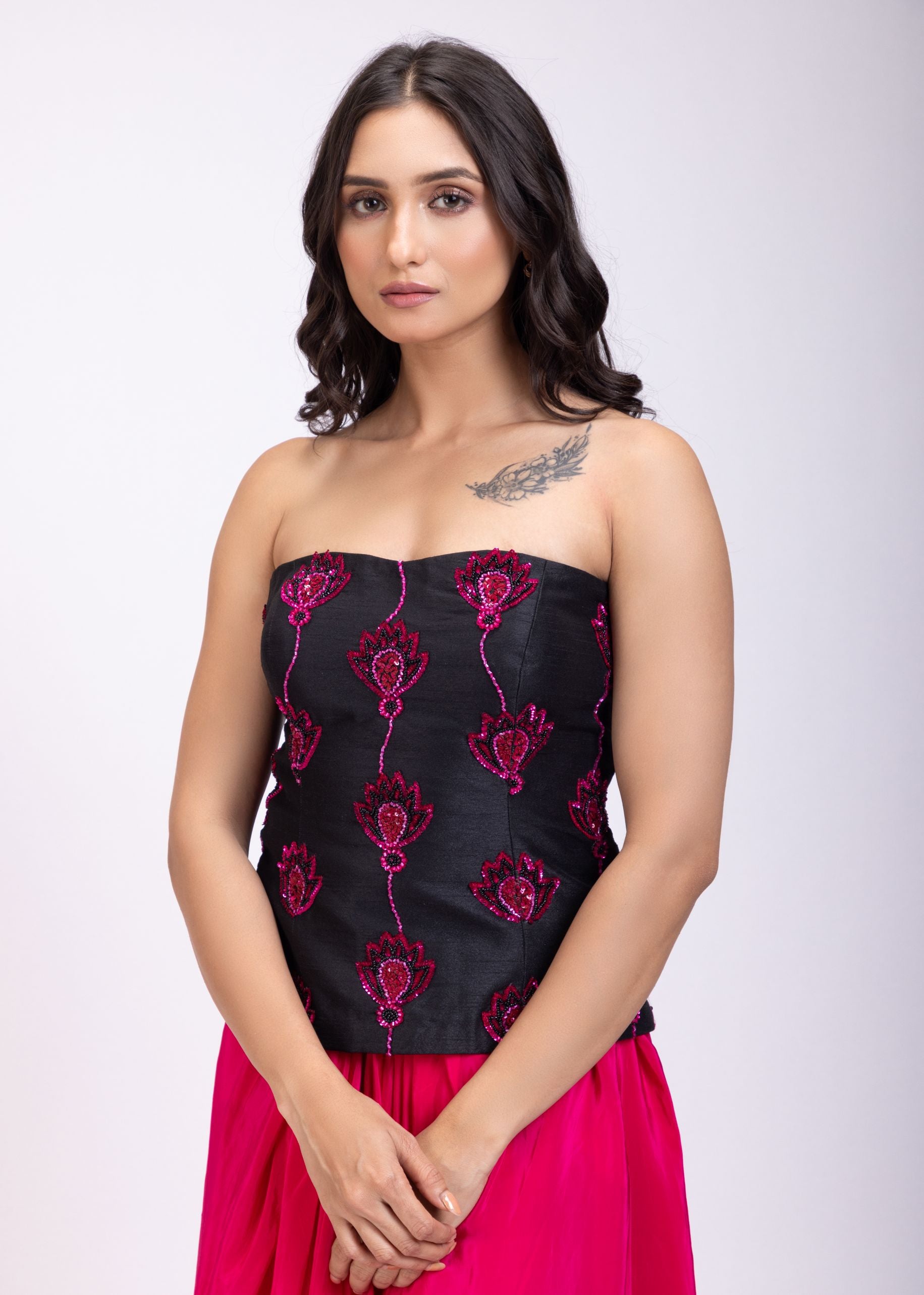 Black Off Shoulder Corset And Drape Skirt With Pink Embroidery And Cut Dana Detail Work close up