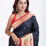 Black Paithani Saree with Red Floral Motif Pallu Close Up
