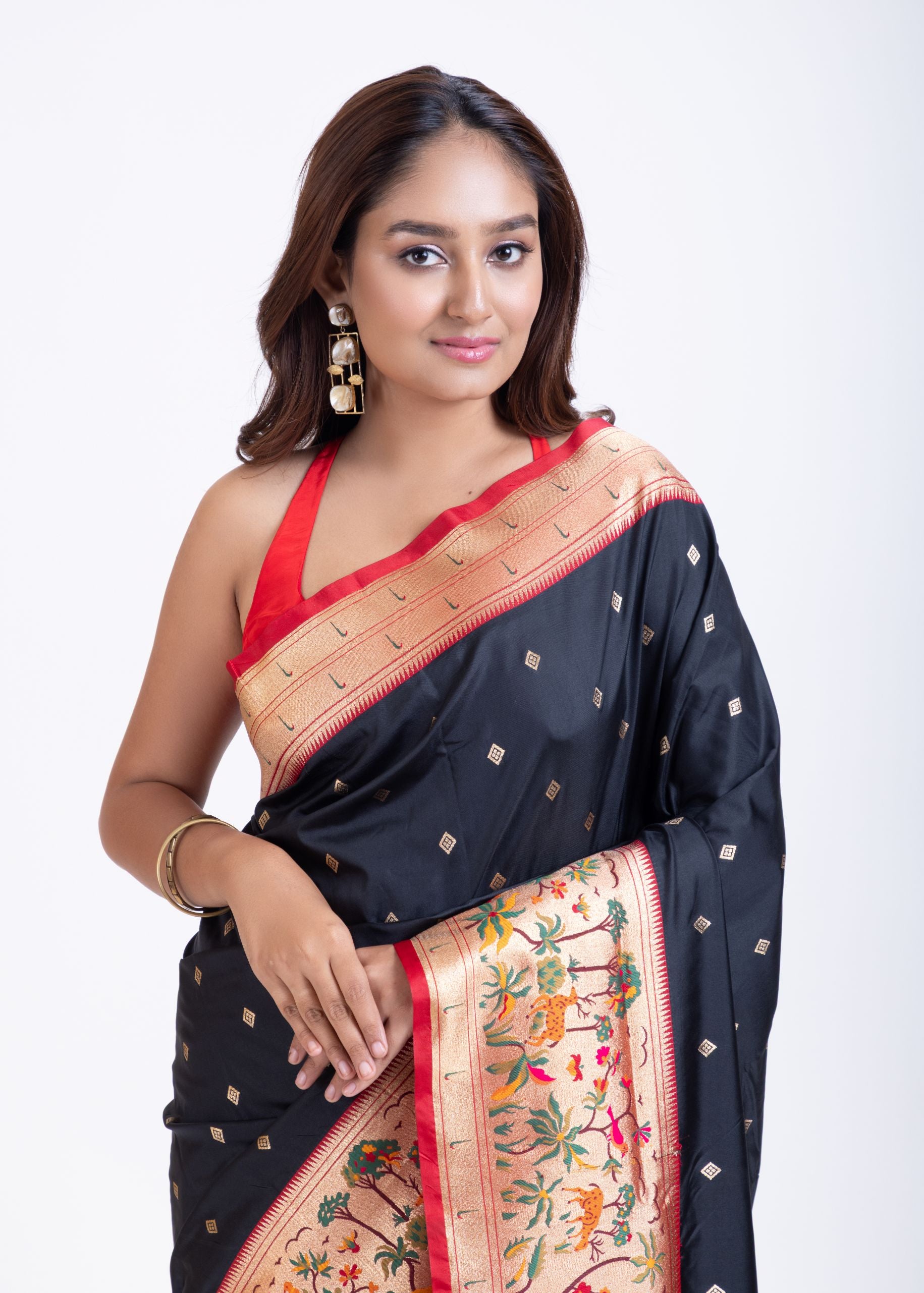 Black Paithani Saree with Red Floral Motif Pallu Close Up
