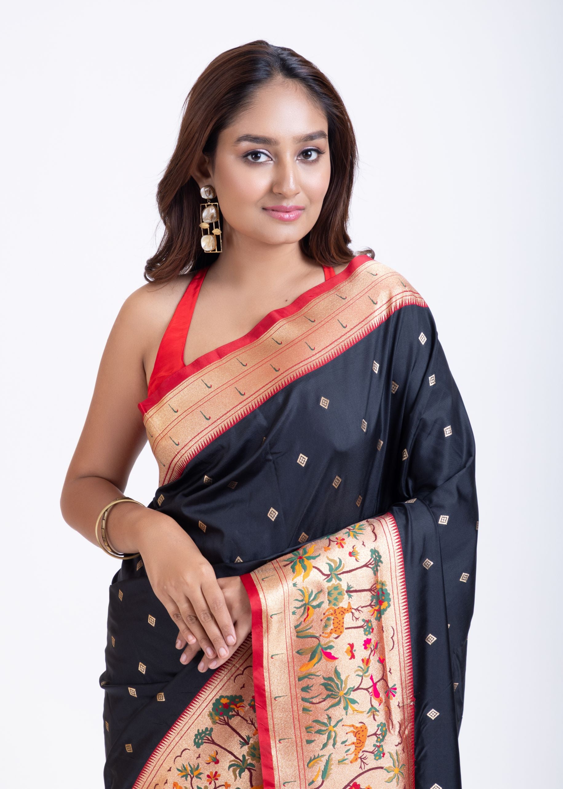 Black Paithani Saree with Red Floral Motif Pallu Close Up
