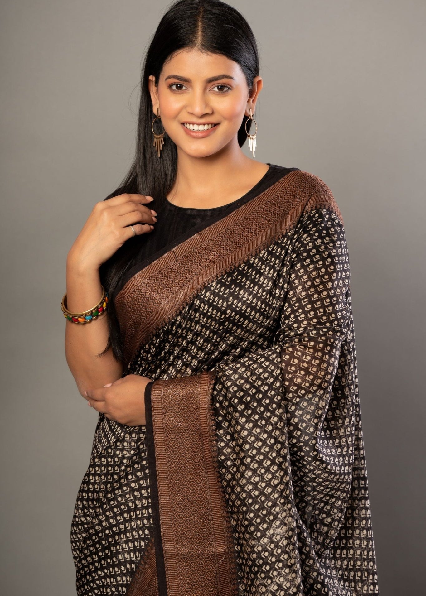 Black Printed Silk Saree With Copper Woven Border - Anvi Couture