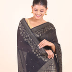 Black Silk Saree With Golden Zari Floral Woven Border Close Up