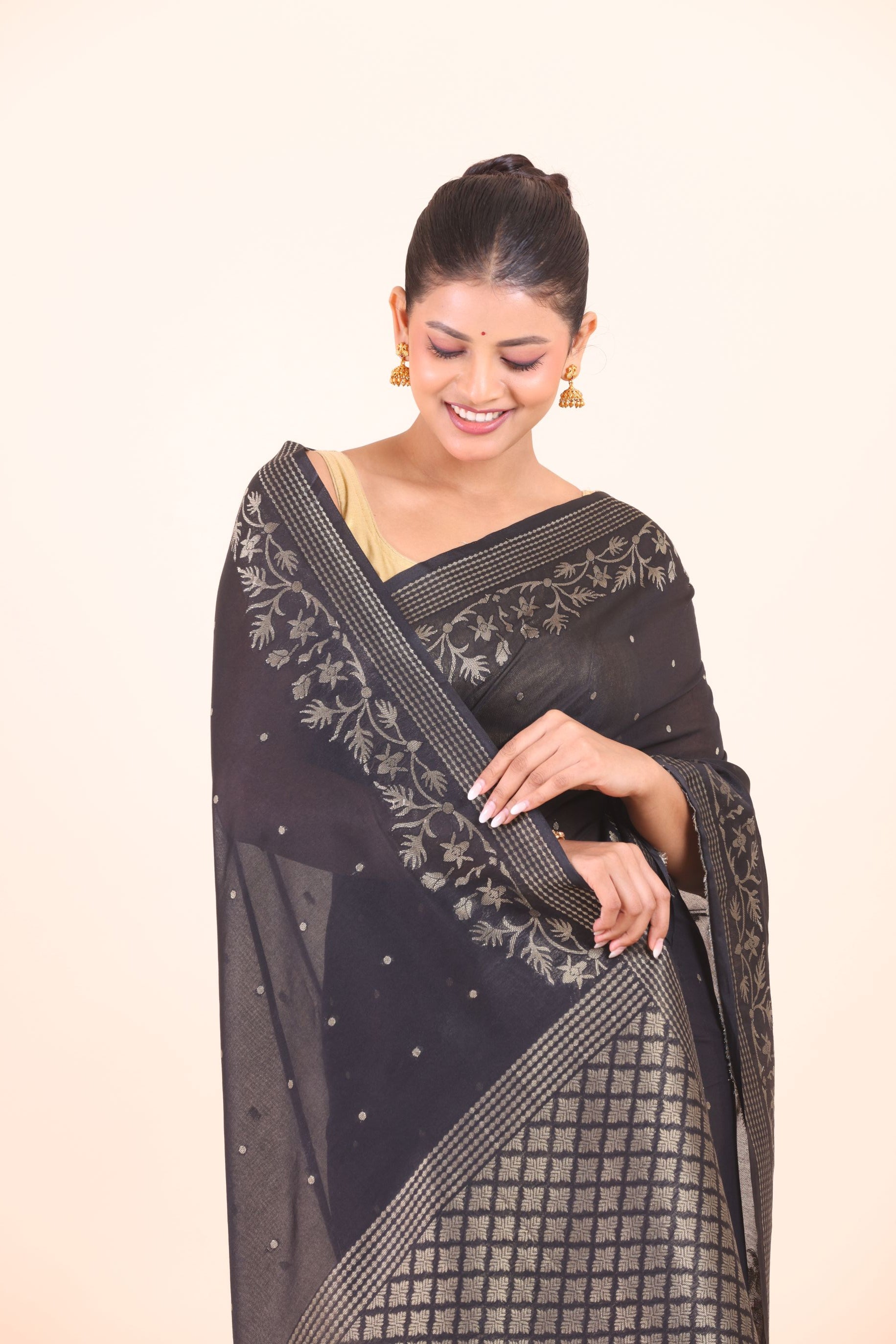 Black Silk Saree With Golden Zari Floral Woven Border Close Up