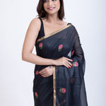 Black Tant Jamdani Saree With Pink Floral Weaving Close Up
