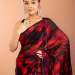 Black and Red Georgette Printed Saree With Sequin Border Close Up
