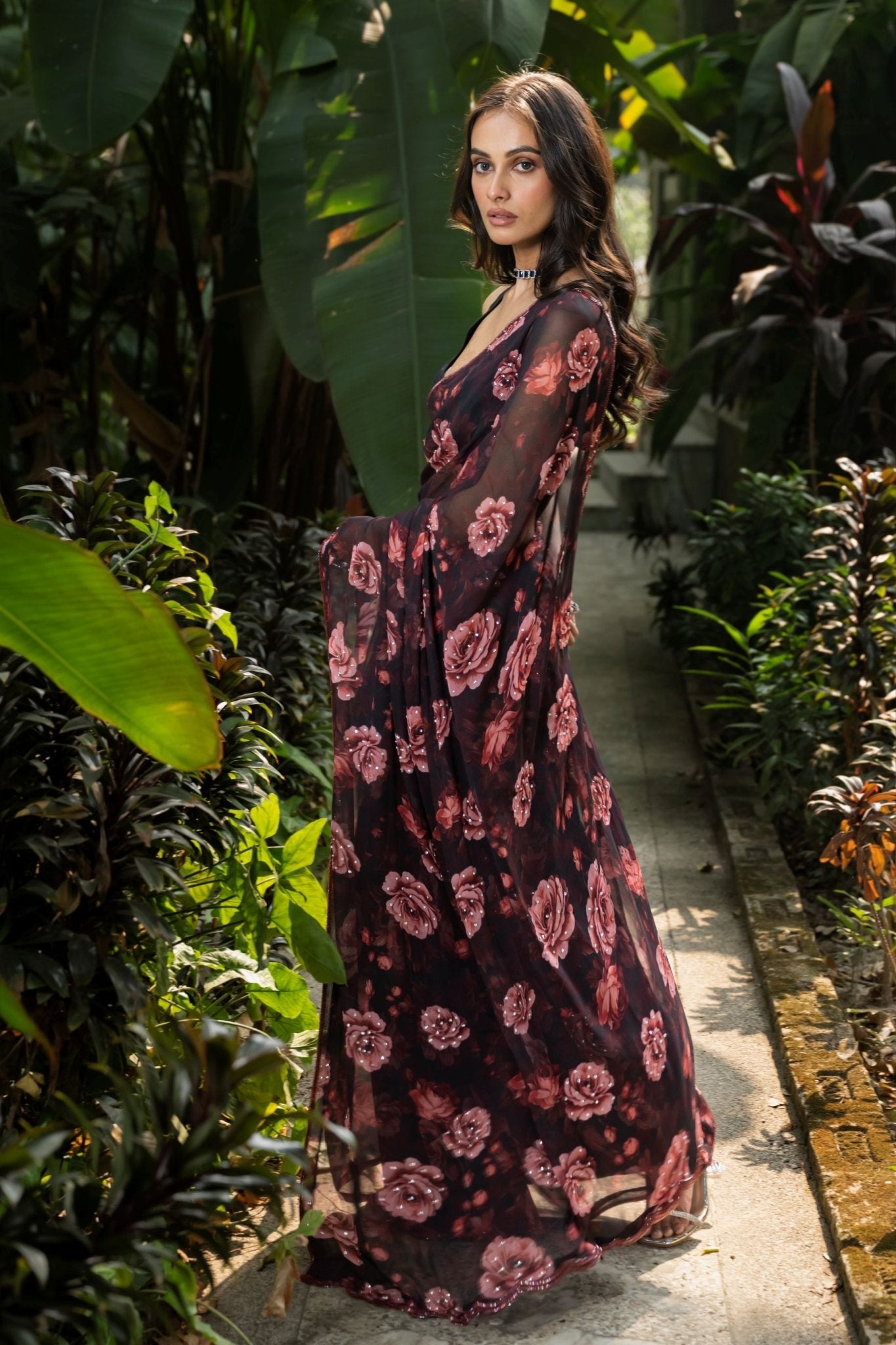 Black georgette saree with rose print — pallu and full drape view, Anvi Couture
