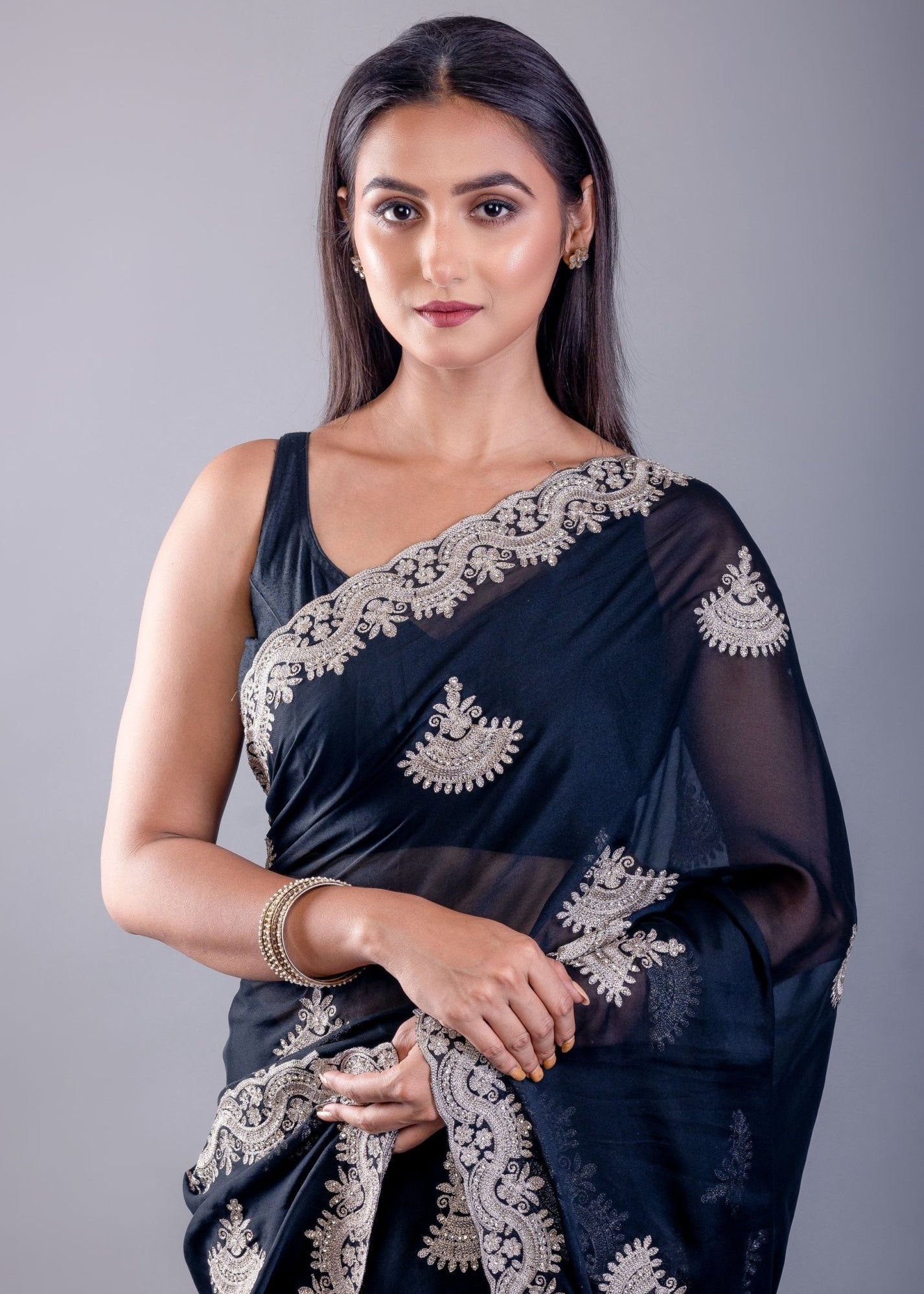 Black party wear saree with intricate white embroidery on Jimmy Choo fabric