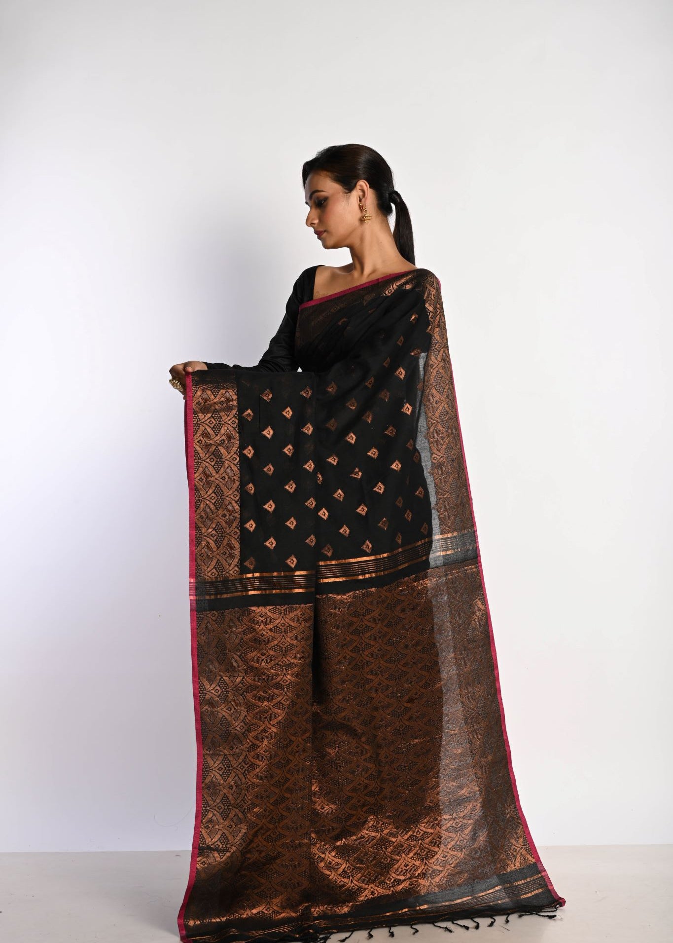 Black party wear saree with zari Jamdani weave