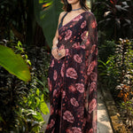 Black rose-print georgette saree — side view showing stone embellishment detail, Anvi Couture