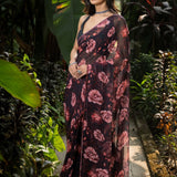 Black rose-print georgette saree — side view showing stone embellishment detail, Anvi Couture
