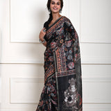 Black saree blouse styled with printed Kalamkari cotton silk drape