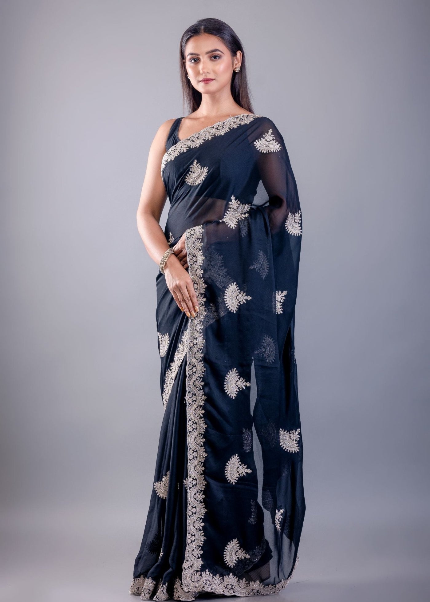 Black saree look in Jimmy Choo fabric with contrast white detailing