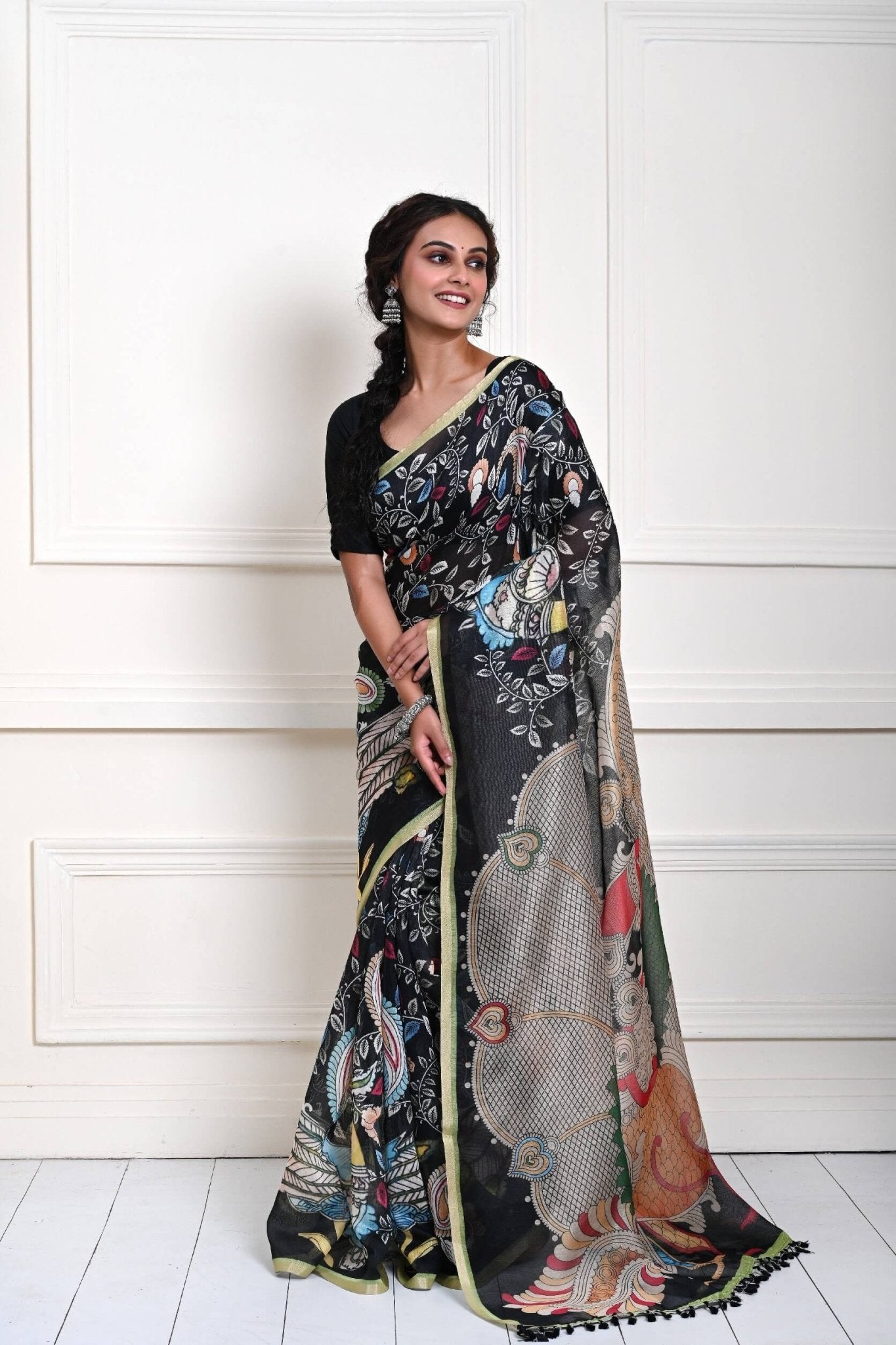 Black saree look with hand-drawn Kalamkari motifs in cotton silk